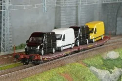 Trix 24428 Wagons plats articulés Laads 800B, Transwaggon, chargé 4 fourgons VW Crafter Trix Trix_24428 - 1