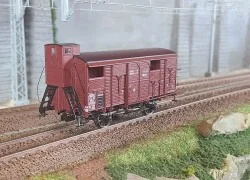 Ree models WB697 PLM 20 T covered wagon, Sideros red, spoked wheels, open doors and guard's cabin
