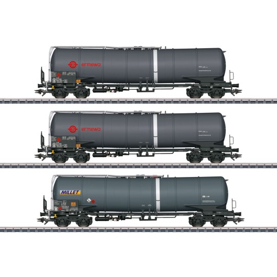 Set of 3 Zacns Ermewa Millet tank wagons, ep. VI - Märklin 4... Marklin_47551-Marklin 47470 Articulated pocket wagon Sdggmrss 738 (T3000e), DB AG, loaded with DB Schenker semi-trailers