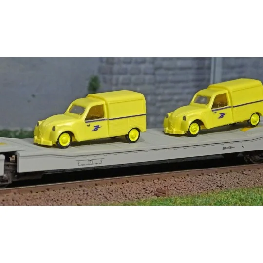 Jouef HJ6205 Ladks 3-axle flat wagon, STVA grey livery, loaded with... HJ6205-Jouef HJ6205 Ladks 3-axle flat wagon, STVA grey livery, loaded with 4 yellow Citroën 2CV "La Poste" vans