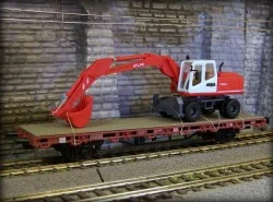 Kibri 26258 Wagon plat à essieux avec pelle à pneu Kibri Kibri_26258 - 1