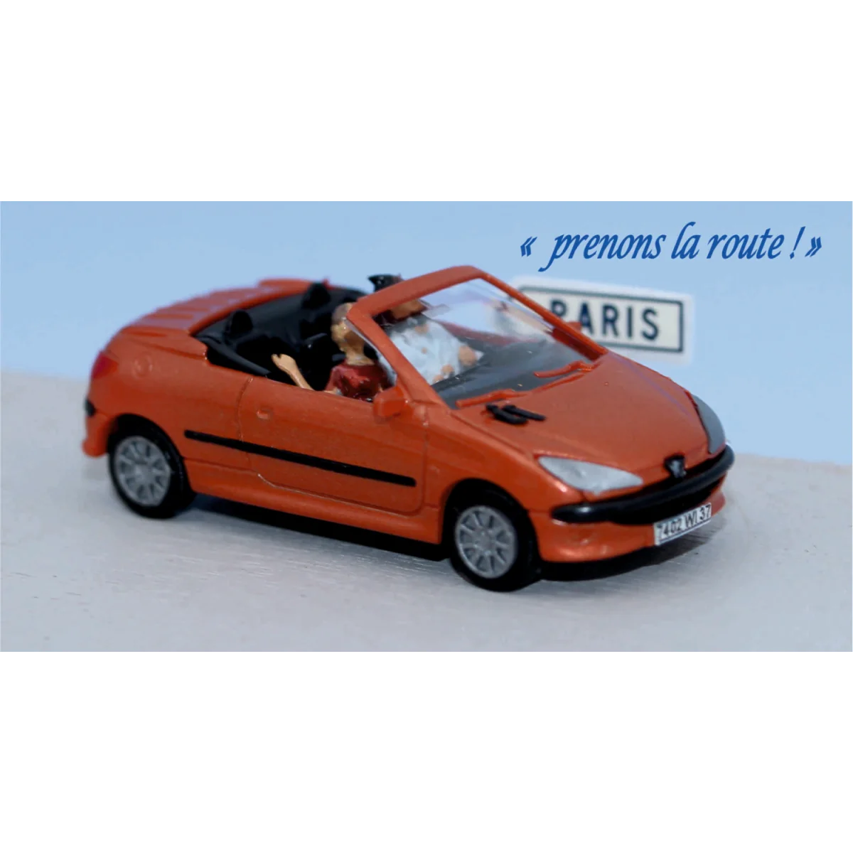 SAI 1633 Peugeot 206 CC ouverte tangerine, avec conducteur et 1 passager Sai Sai_1633 - 1 SAI 1633 Peugeot 206 CC ouverte tangerine, avec conducteur et 1 passager Sai Sai_1633 - 1