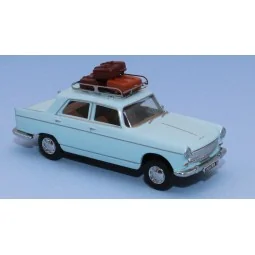 SAI 1822 Peugeot 404 pastel blue, roof rack and 3 suitcases - Sai_1822