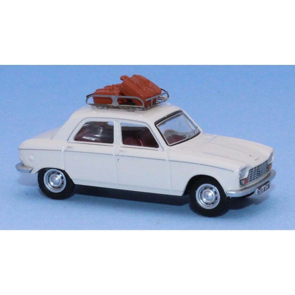 SAI 1722 Peugeot 204, Courchevel white, roof rack and 2 suitcases SAI 1722 Peugeot 204, Courchevel white, roof rack and 2 suitcases